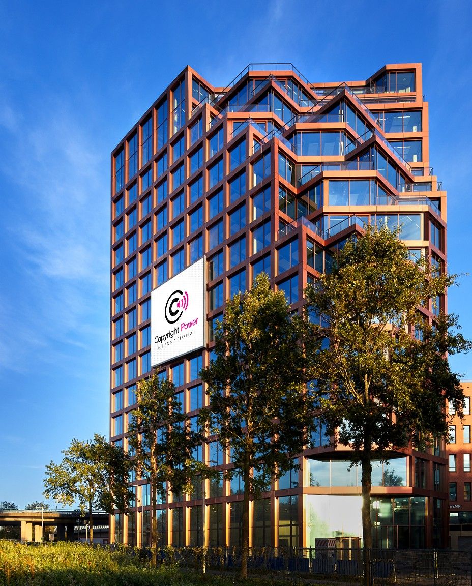 The Orato building on the H.J.E. Wenckebachweg in Amsterdam, with the Copyright Power International logo on the facade